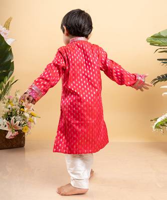Elegant red kurta with golden embroidery paired with classic white pants 3