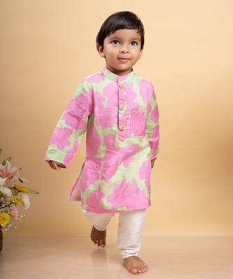 Vibrant pink and green tie-dye kurta paired with classic white pants 1