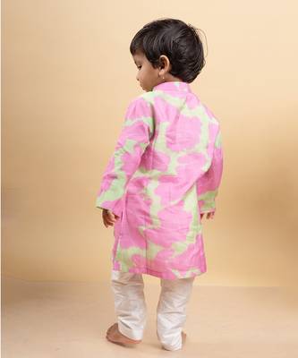 Vibrant pink and green tie-dye kurta paired with classic white pants 3