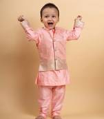 Elegant soft peach kurta set with a regal golden-detailed jacket