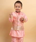 Elegant soft peach kurta set with a regal golden-detailed jacket