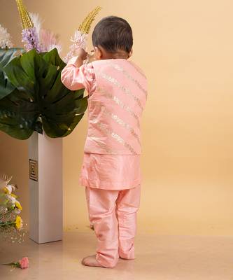 Elegant soft peach kurta set with a regal golden-detailed jacket 3