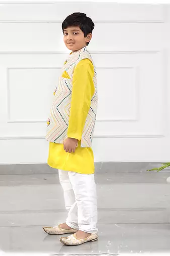Yellow kurta with off white sequins embroidered jacket and pyjama
