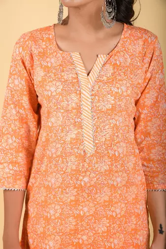 Classic 3 piece floral orange kurta & lining pants accompanied.