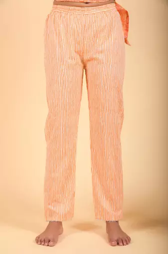 Classic 3 piece floral orange kurta & lining pants accompanied.