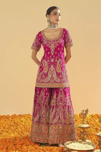 Ishwa hotpink short kurta with sharara and dupatta