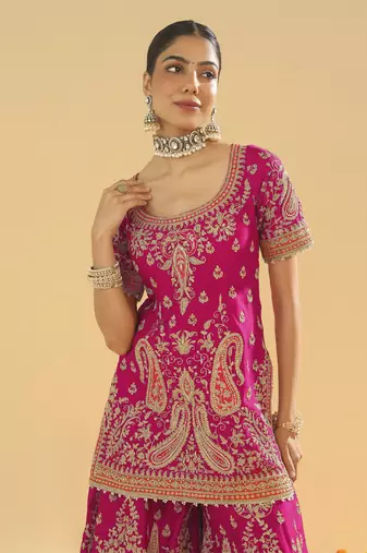Ishwa hotpink short kurta with sharara and dupatta