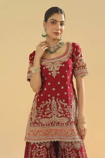 Sehrish deep red short kurta with sharara and dupatta