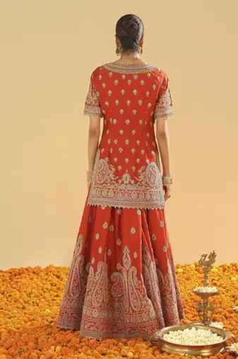 Shazfa burnt orange short kurta with sharara and dupatta