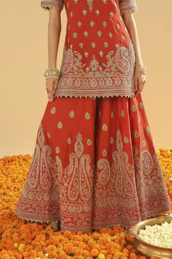 Shazfa burnt orange short kurta with sharara and dupatta