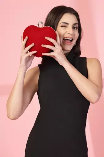 red velvet heart-shaped clutch bag
