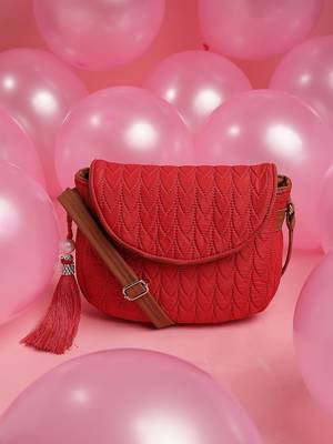 red polyester  sling bag with tassel charm design 1