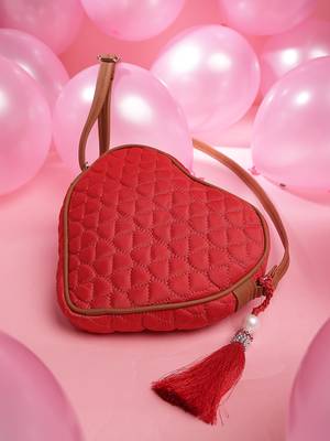 red tan polyester sling bag with chevron quilting 1