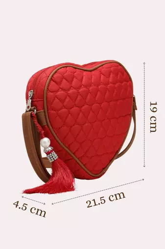 red tan polyester sling bag with chevron quilting