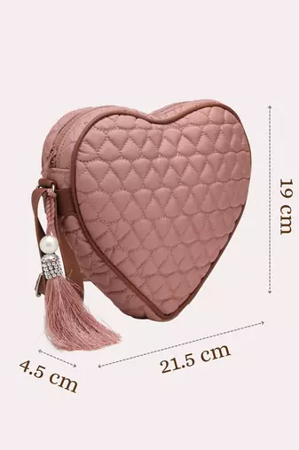 dusty pink polyester sling bag with chevron quilting
