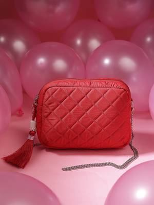 red polyester sling bag with diamond quilting 1