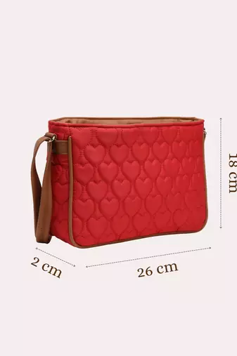 red tan polyester vegan leather sling bag