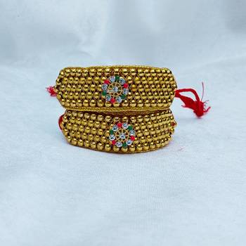 Stone stud gold plated  pouchi color golden material brass  size adjustable 3