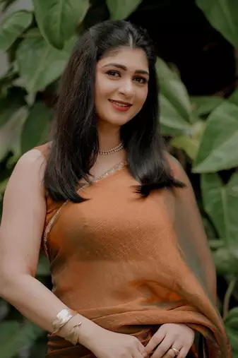Orange simmer tissue golden saree with golden handwork lace & blouse piece