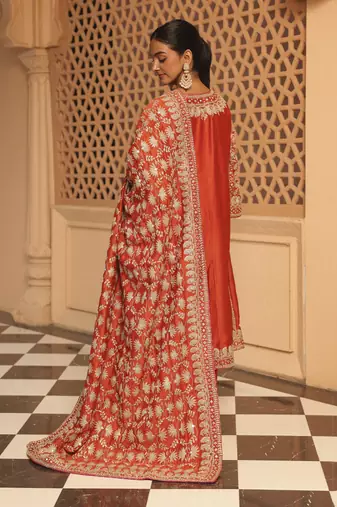 Burnt orange aiman - short knee length chauga with salwar and khada dupatta