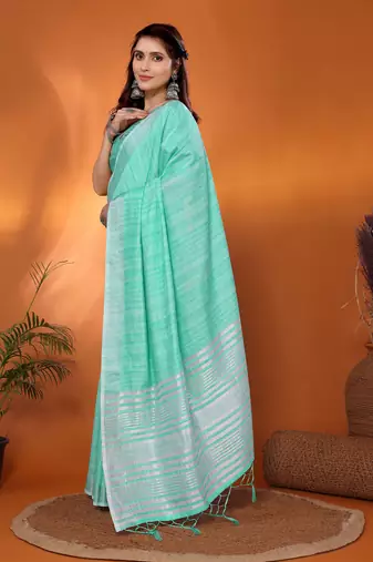 Green pure linen bollywood plain saree with silver zari border