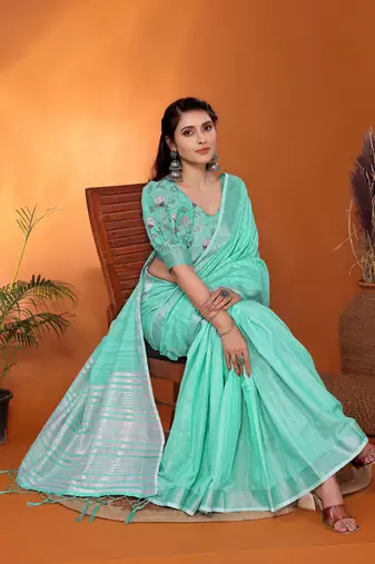 Green pure linen bollywood plain saree with silver zari border