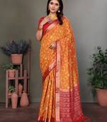 Orange soft silk woven designed patola saree with golden zari border