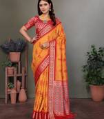 Orange soft silk floral designed patola saree