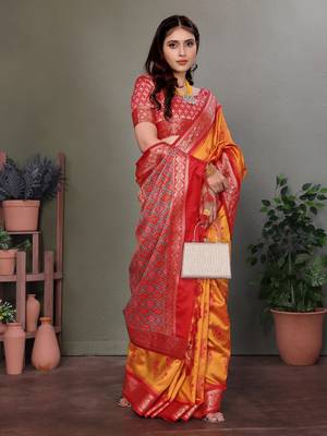Orange soft silk floral designed patola saree 2