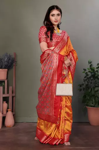 Orange soft silk floral designed patola saree