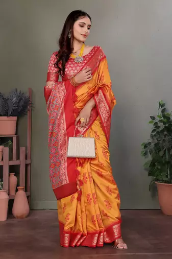 Orange soft silk floral designed patola saree