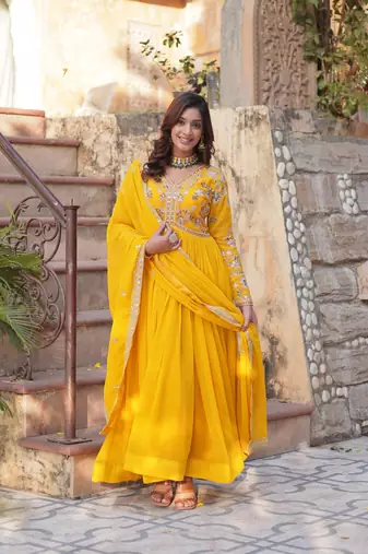 Yellow georgette sequins zari embroidered falred gown with heavy dupatta