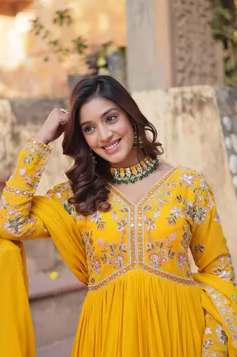 Yellow georgette sequins zari embroidered falred gown with heavy dupatta