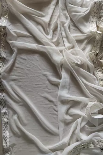 Delightful Off White zari and sequins embroidered Georgette indian Lehenga Choli dress