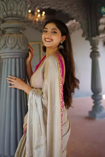 Beige art Silk Saree with Embroidered Lace Border and Magenta Pink blouse