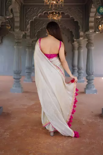 Beige art Silk Saree with Embroidered Lace Border and Magenta Pink blouse