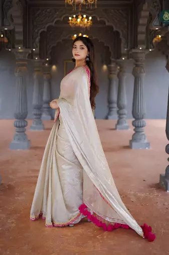 Beige art Silk Saree with Embroidered Lace Border and Magenta Pink blouse