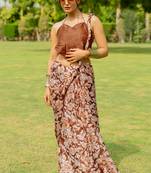 Dark rust floral print chiffon saree with unstiched blouse piece