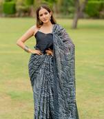 Dark greyish blue leheriya print chiffon saree with unstiched blouse piece