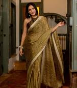 Dark mustard geometric print chiffon saree with unstiched blouse piece