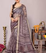 Dusty rose pink ikkat print kota doria polyester saree with unstiched blouse piece