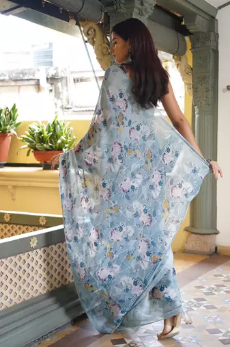 Light dusty blue floral print chiffon saree with unstiched blouse piece