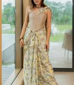 Cream floral print chiffon saree with unstiched blouse piece
