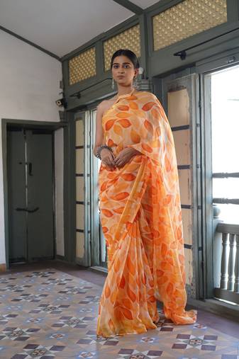 Light orange floral print chiffon saree with unstiched blouse piece