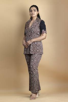 Black co ord set pure ajrakh fabric embellished with fine thread details on sleeves paired with bell bottoms 1