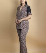Black co ord set pure ajrakh fabric embellished with fine thread details on sleeves paired with bell bottoms