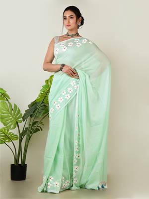 Aakar pastel green handloom cotton saree with delicate handcrafted floral art 1