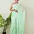 Aakar pastel green handloom cotton saree with delicate handcrafted floral art