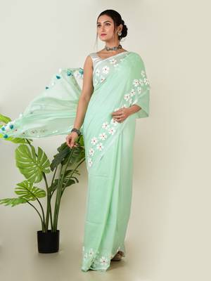 Aakar pastel green handloom cotton saree with delicate handcrafted floral art 2