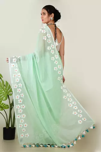 Aakar pastel green handloom cotton saree with delicate handcrafted floral art
